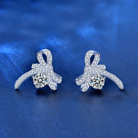 elegant silver diamond ear studs with ribbon design and moissanite diamonds